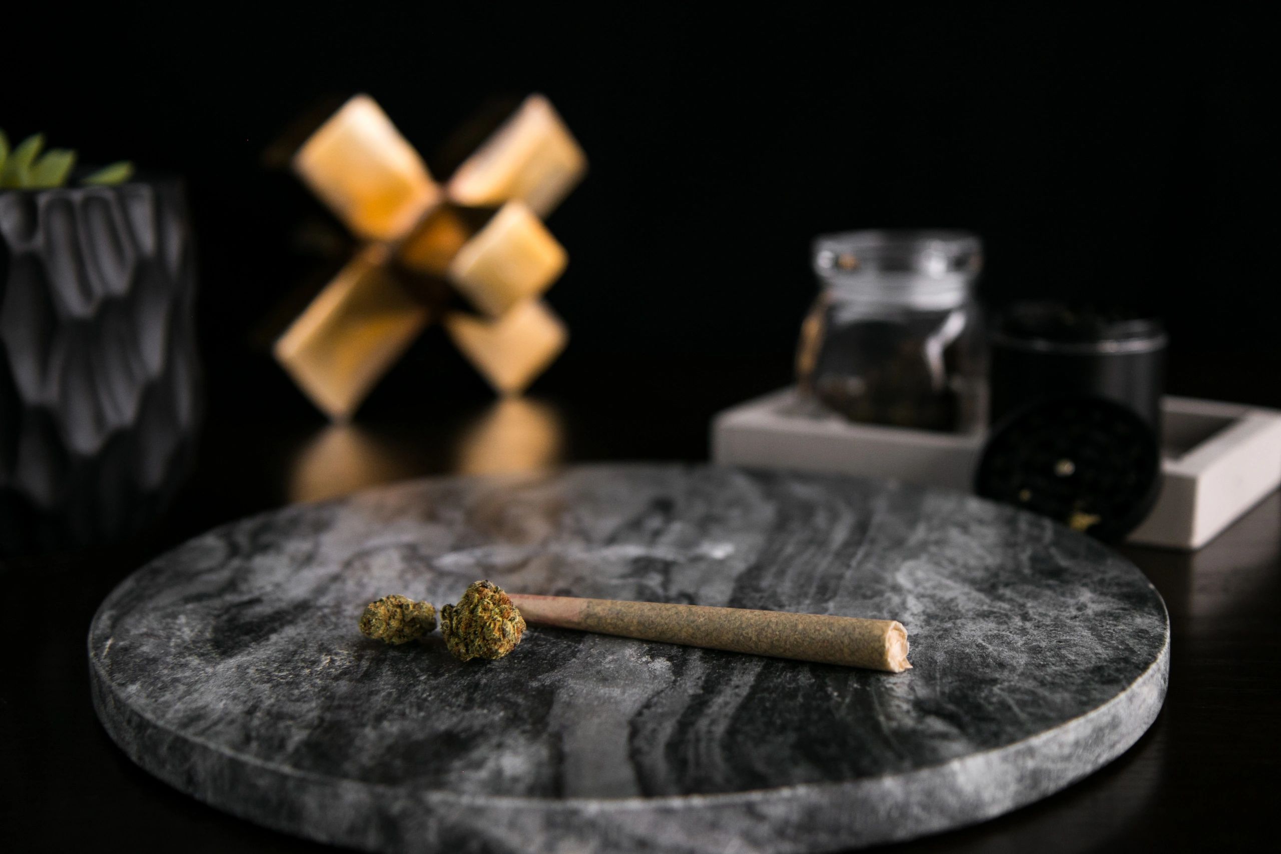 Premium cannabis buds on a dark luxury background